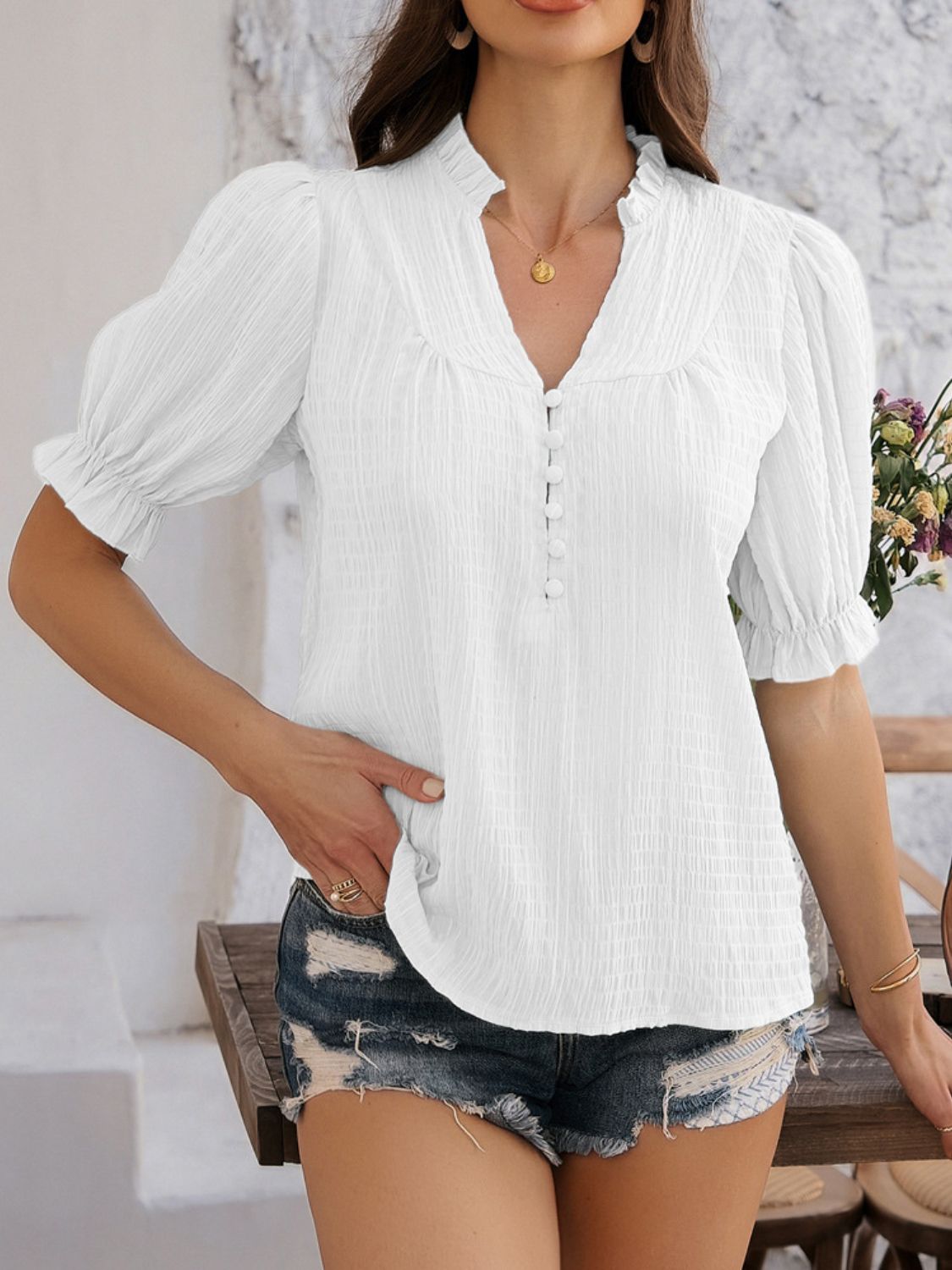 Devine frill notched short sleeve blouse.