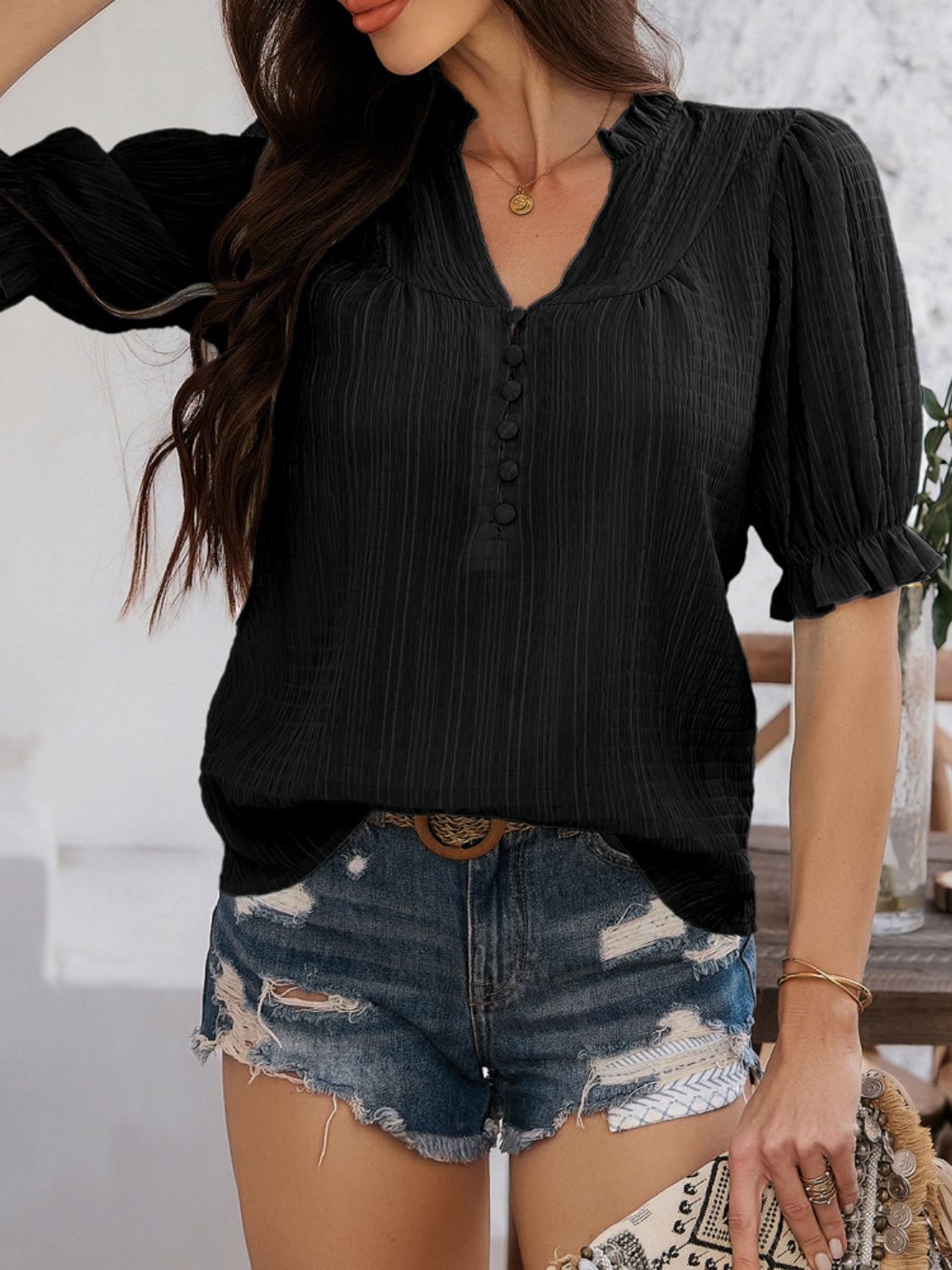 Devine frill notched short sleeve blouse.