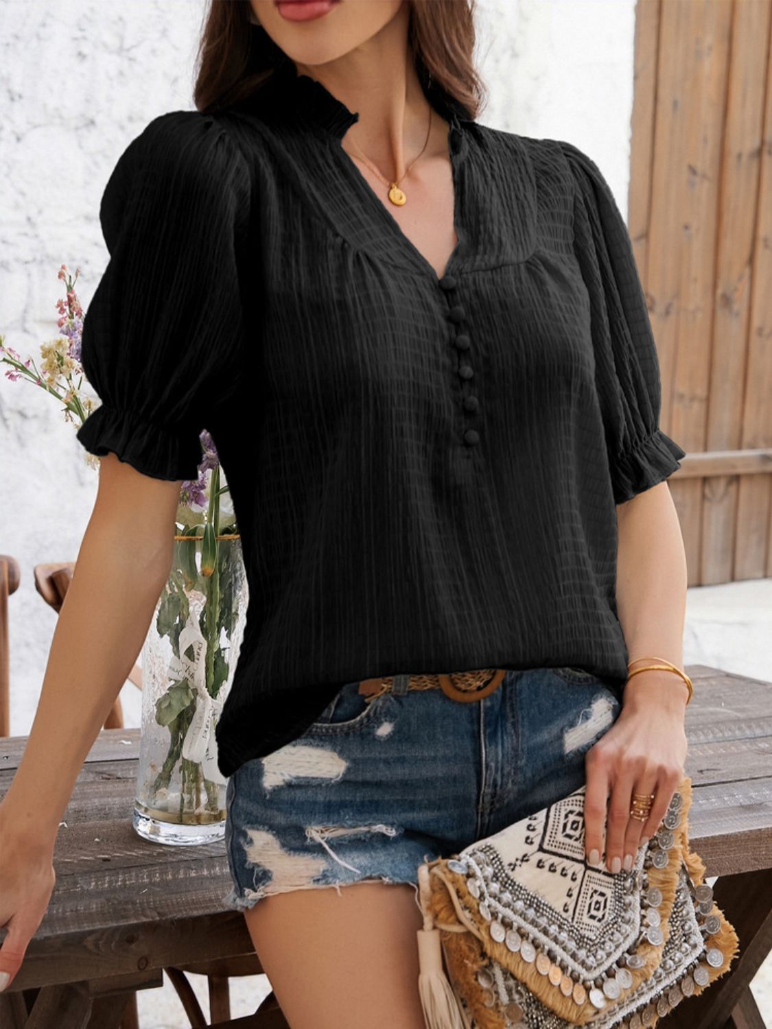 Devine frill notched short sleeve blouse.