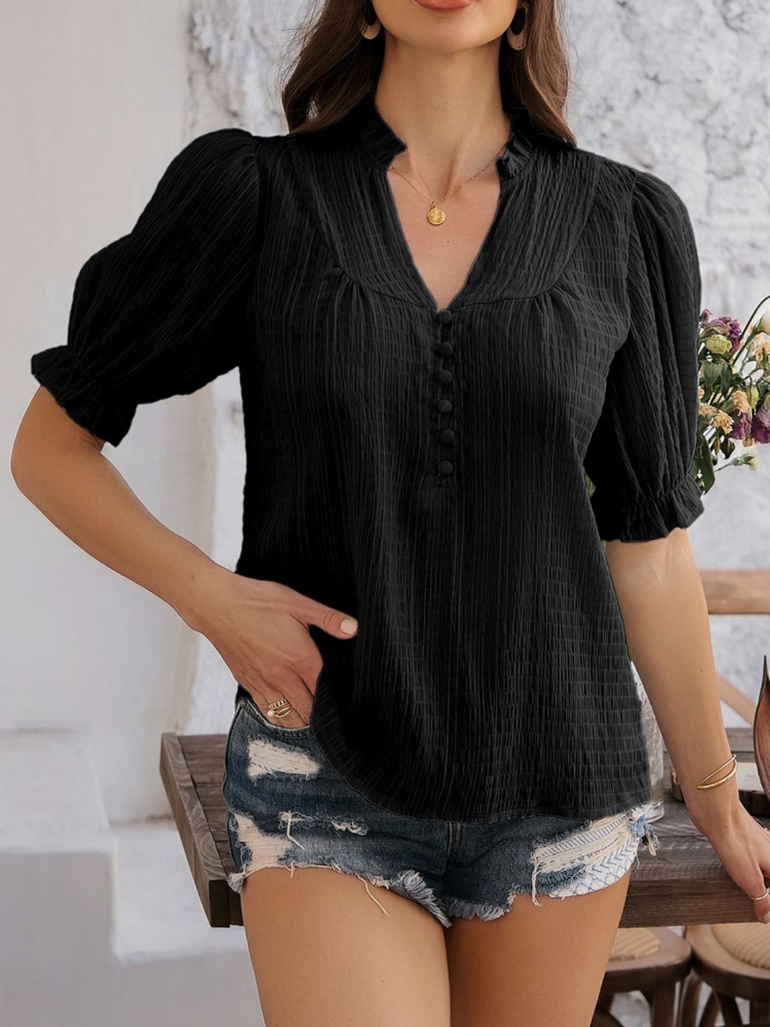 Devine frill notched short sleeve blouse.