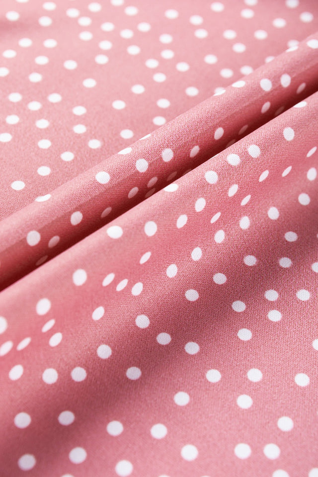Frill polka dot cap sleeve blouse.