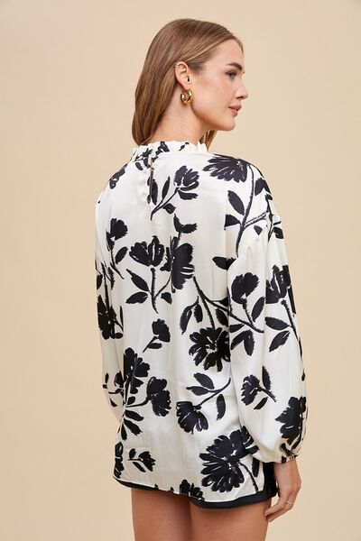 Annie Wear frill printed balloon sleeve blouse.