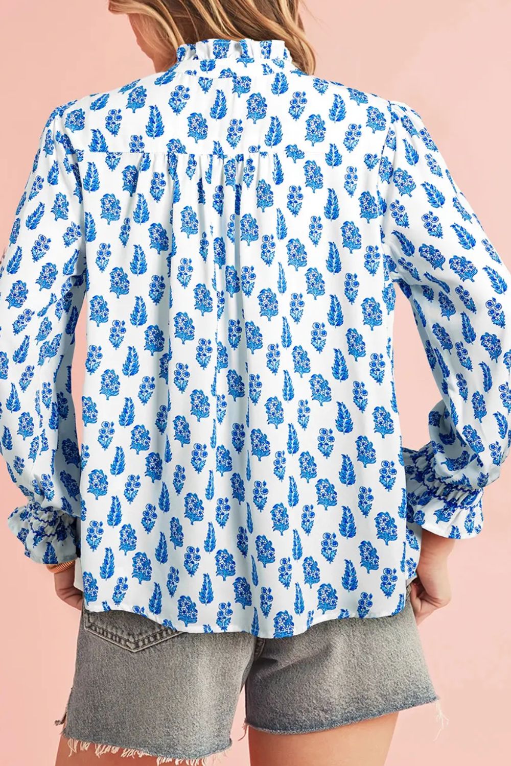 Frill printed button-up long sleeve shirt.