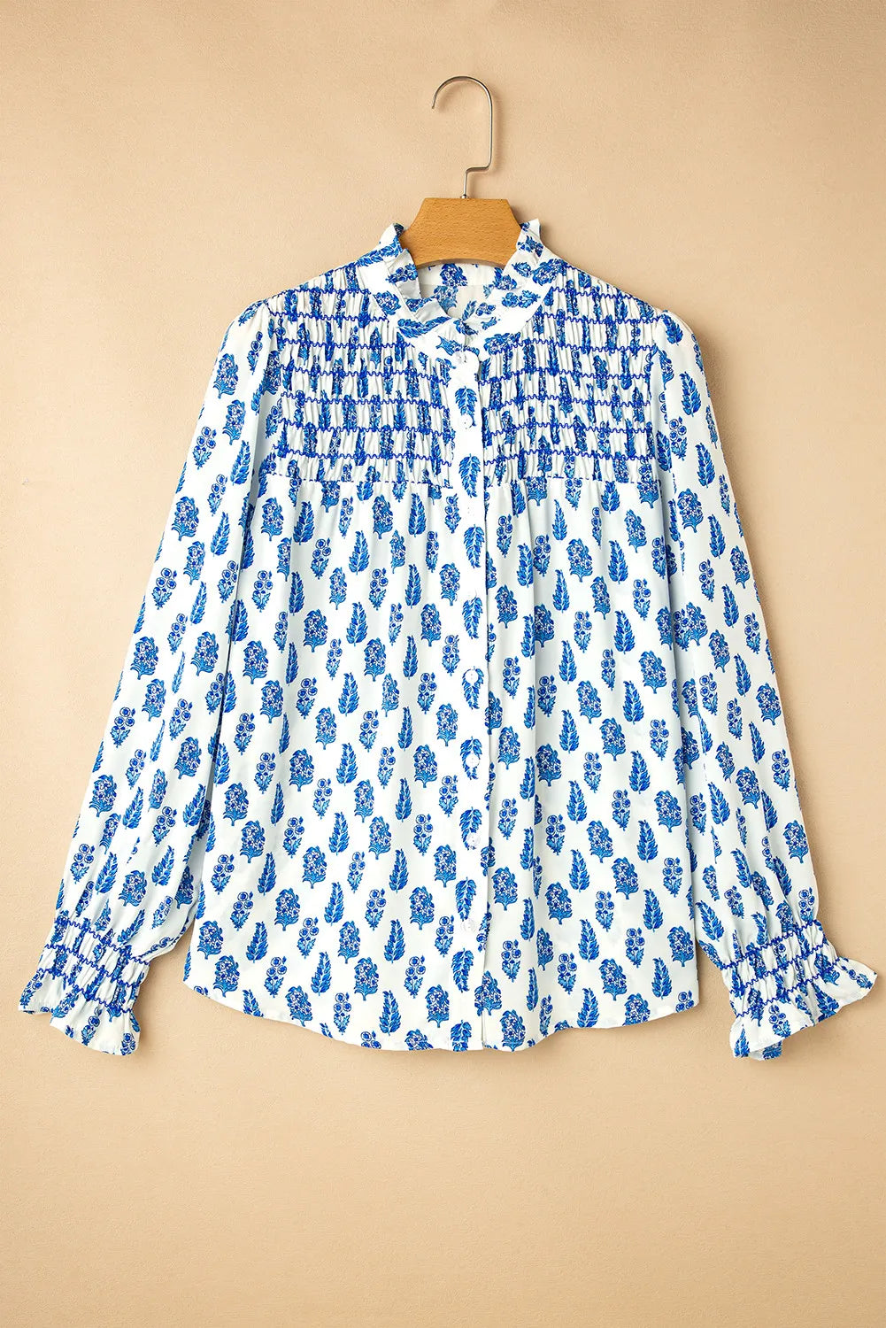 Frill printed button-up long sleeve shirt.