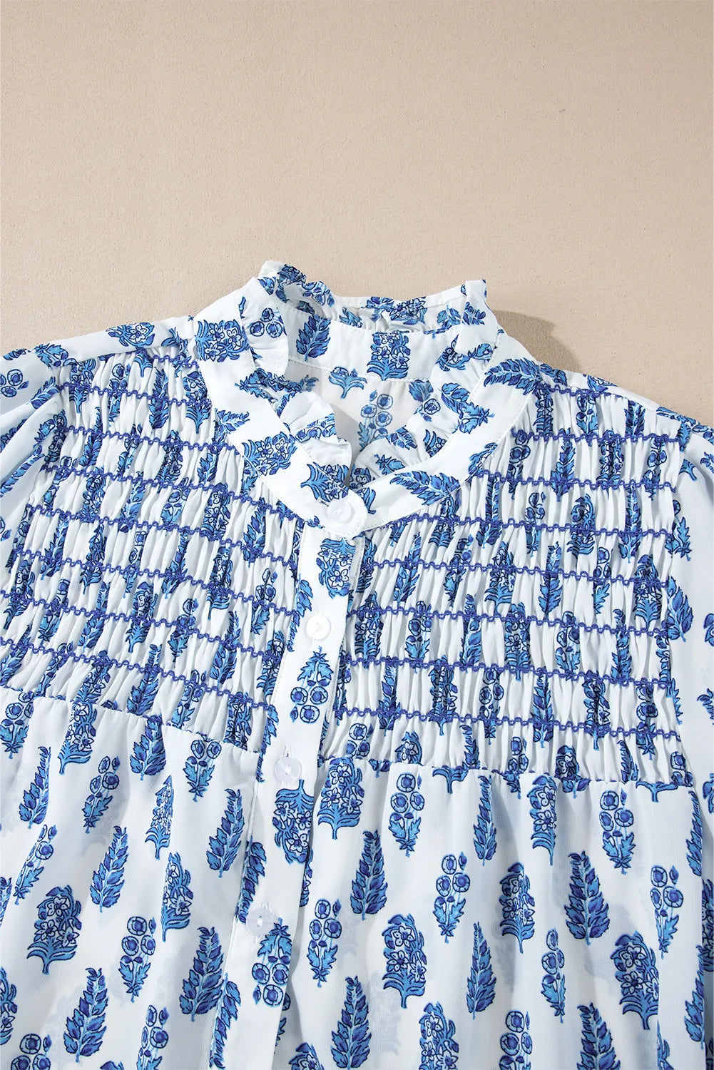 Frill printed button-up long sleeve shirt.