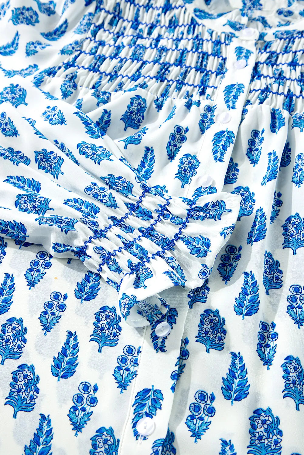 Frill printed button-up long sleeve shirt.