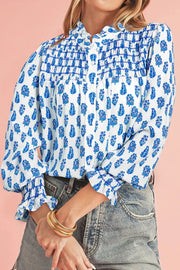 Frill printed button-up long sleeve shirt.
