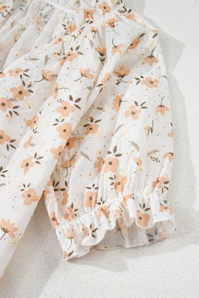 Frill printed notched short sleeve blouse.