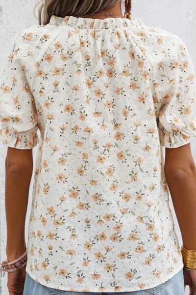 Frill printed notched short sleeve blouse.