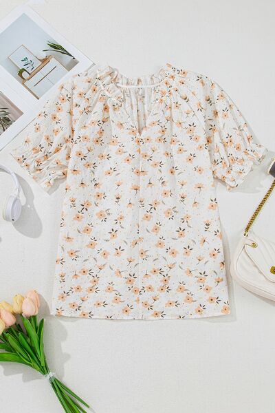 Frill printed notched short sleeve blouse.