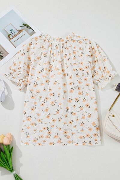 Frill printed notched short sleeve blouse.