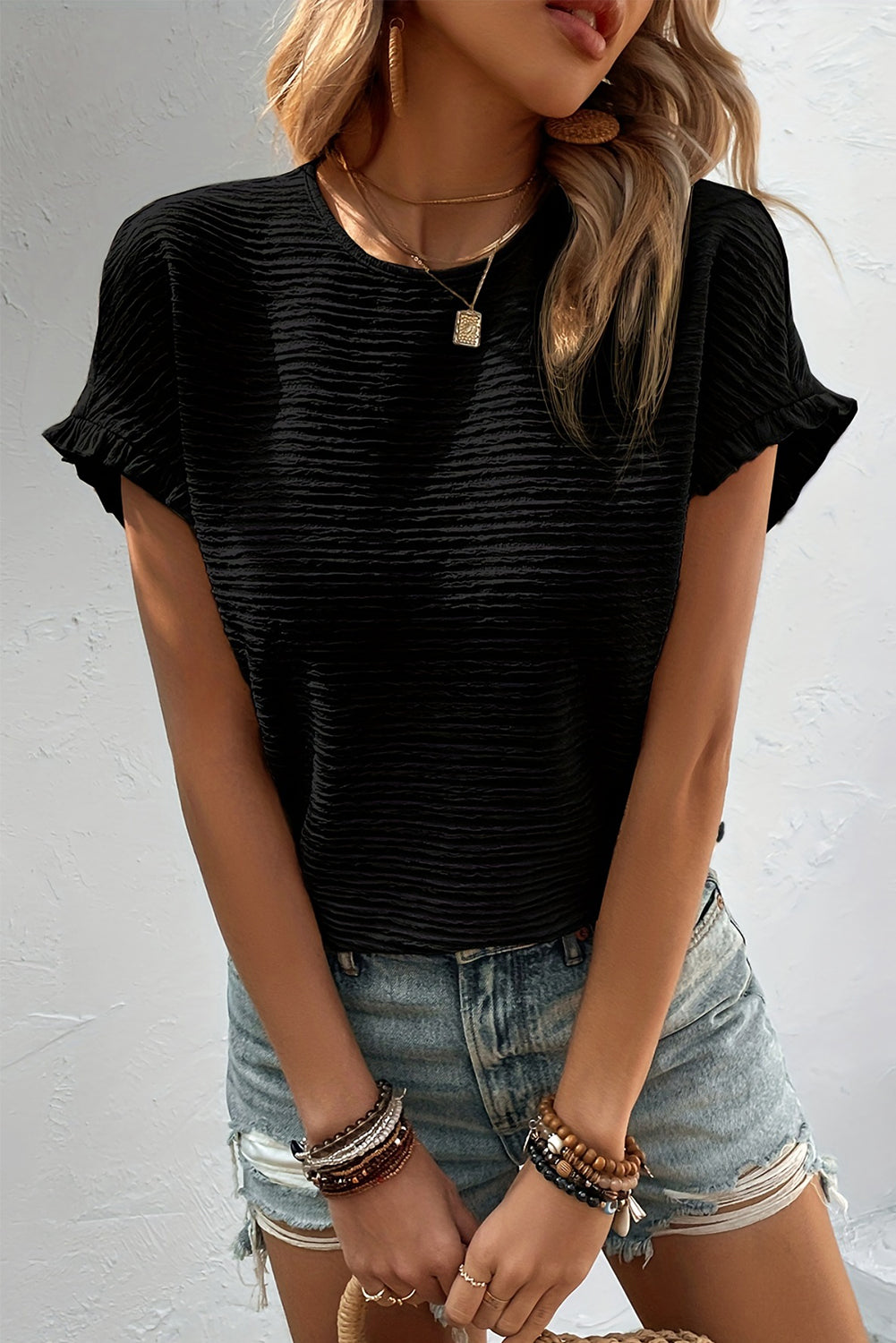 Frill round neck cap sleeve blouse.