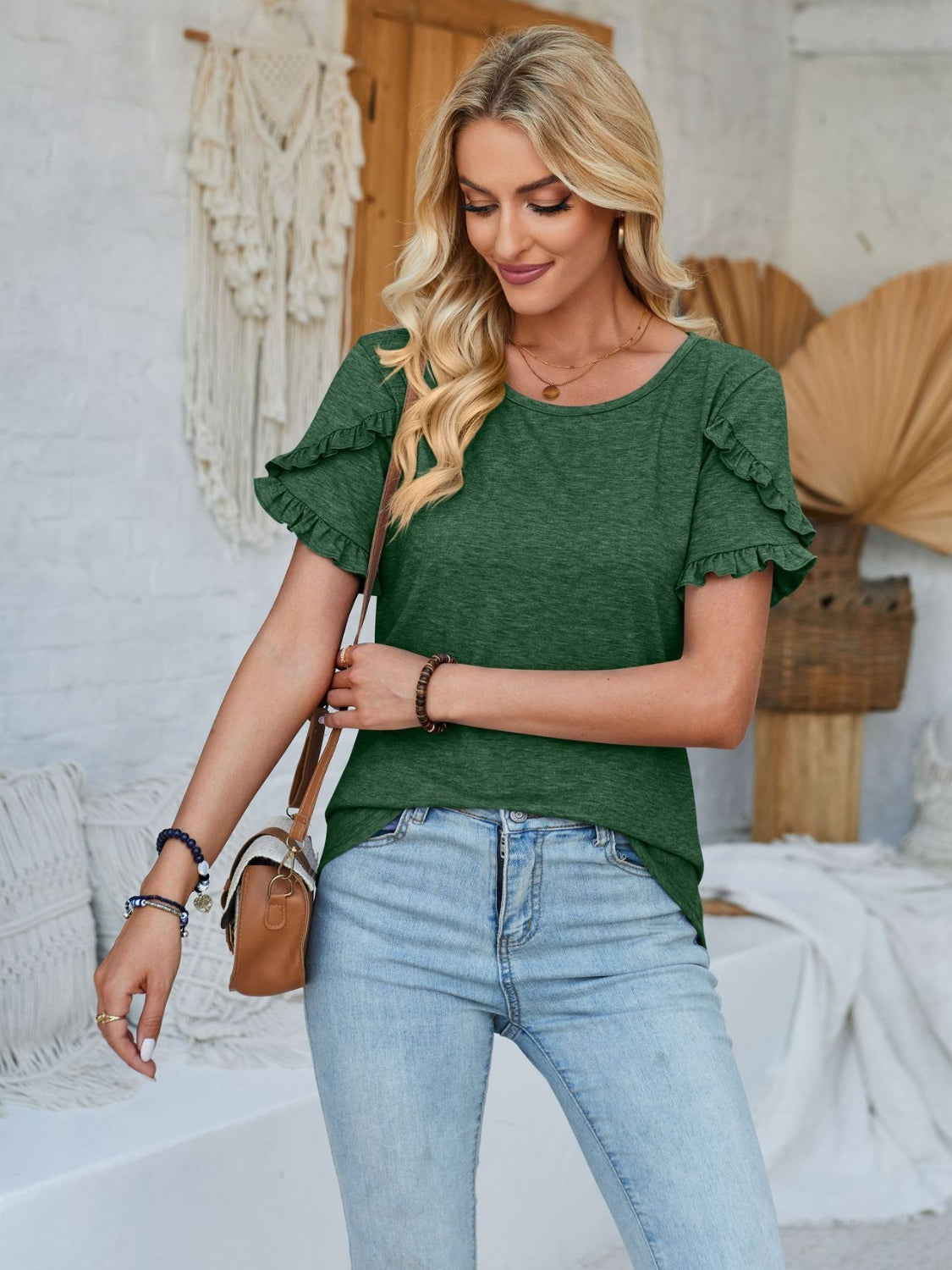 Frill round neck petal sleeve blouse.