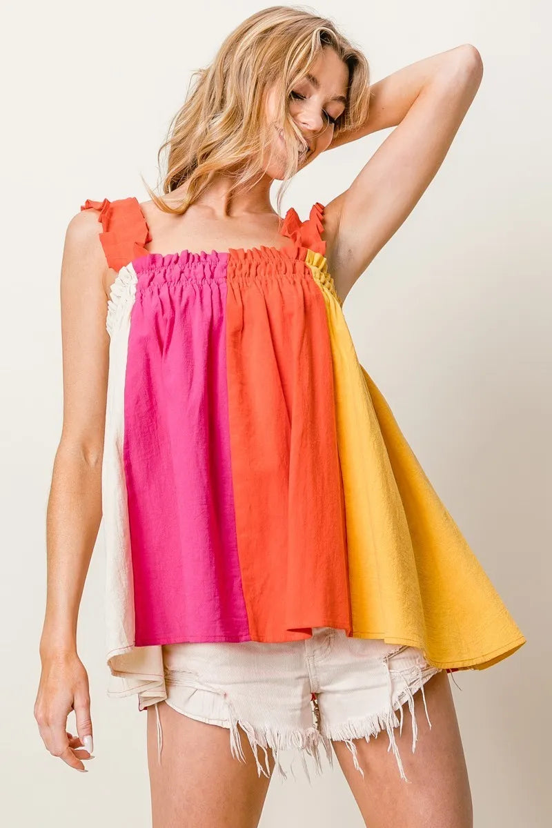Frill shoulder strap color block bodice top with ruffled and smocked babydoll design, slightly stretchy.