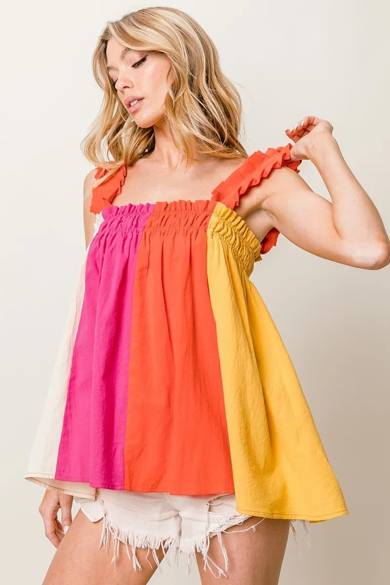 Frill shoulder strap color block bodice top with ruffled and smocked babydoll design, slightly stretchy.