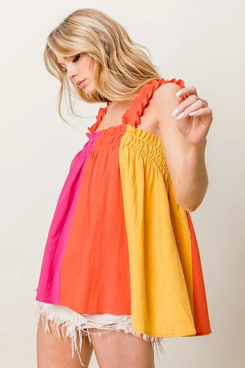 Frill shoulder strap color block bodice top with ruffled and smocked babydoll design, slightly stretchy.