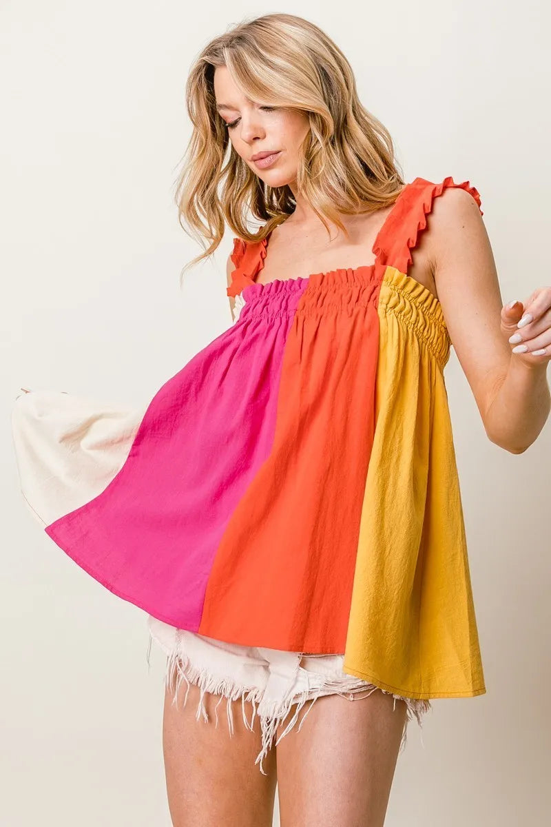 Frill shoulder strap color block bodice top with ruffled and smocked babydoll design, slightly stretchy.