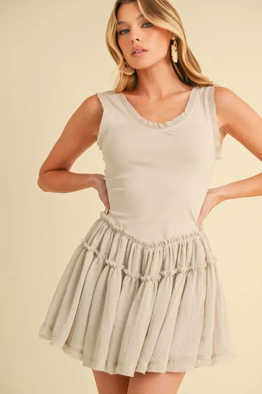 Aemi Co Frill Sleeveless Drop Waist Mini Dress.