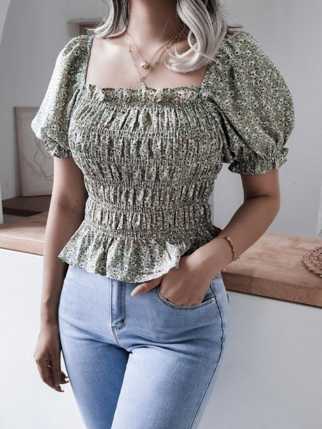 Frill smocked square neck short sleeve blouse.