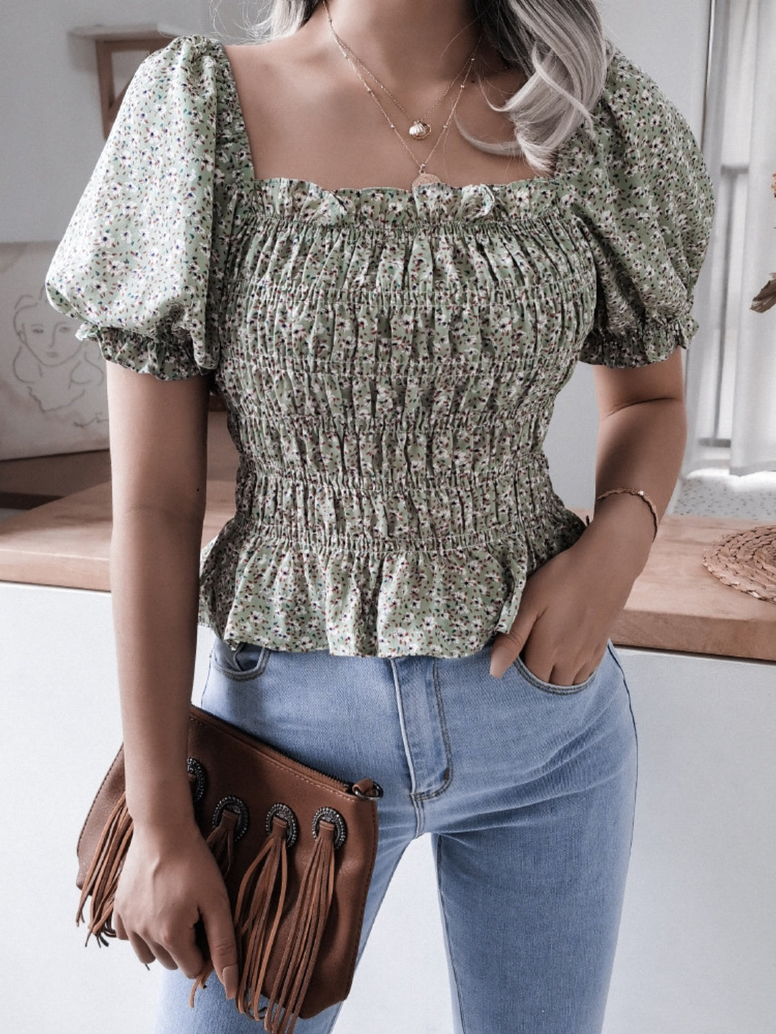 Frill smocked square neck short sleeve blouse.