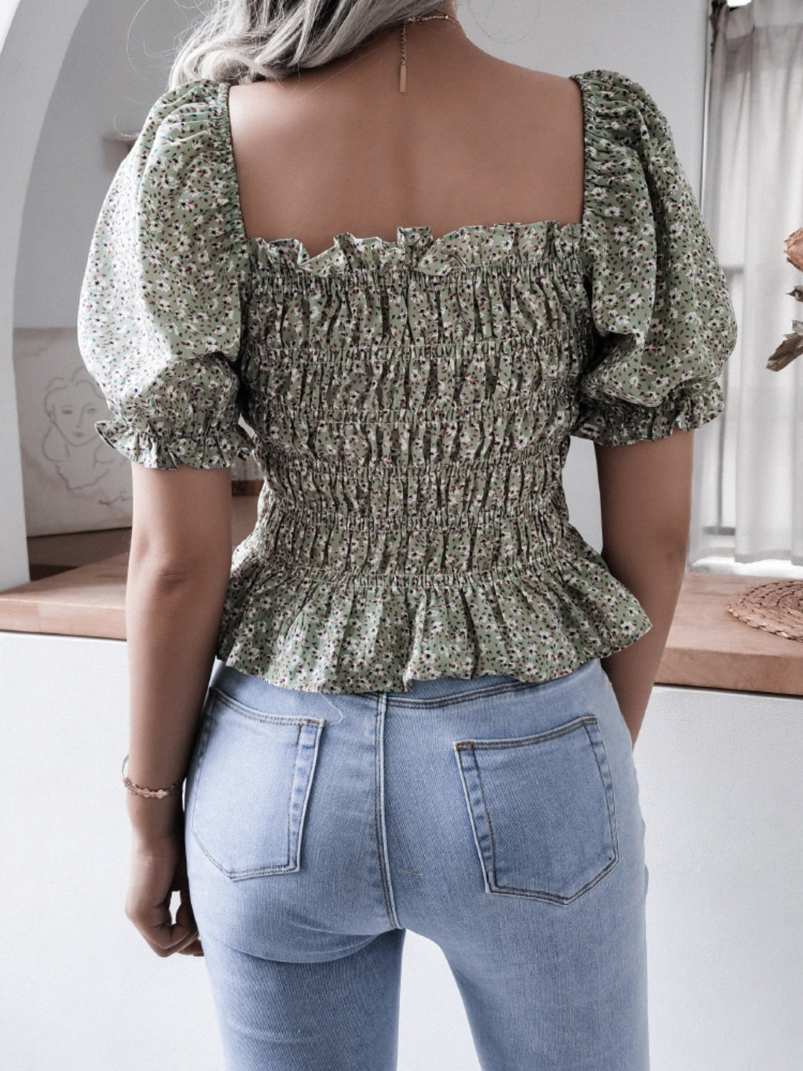 Frill smocked square neck short sleeve blouse.