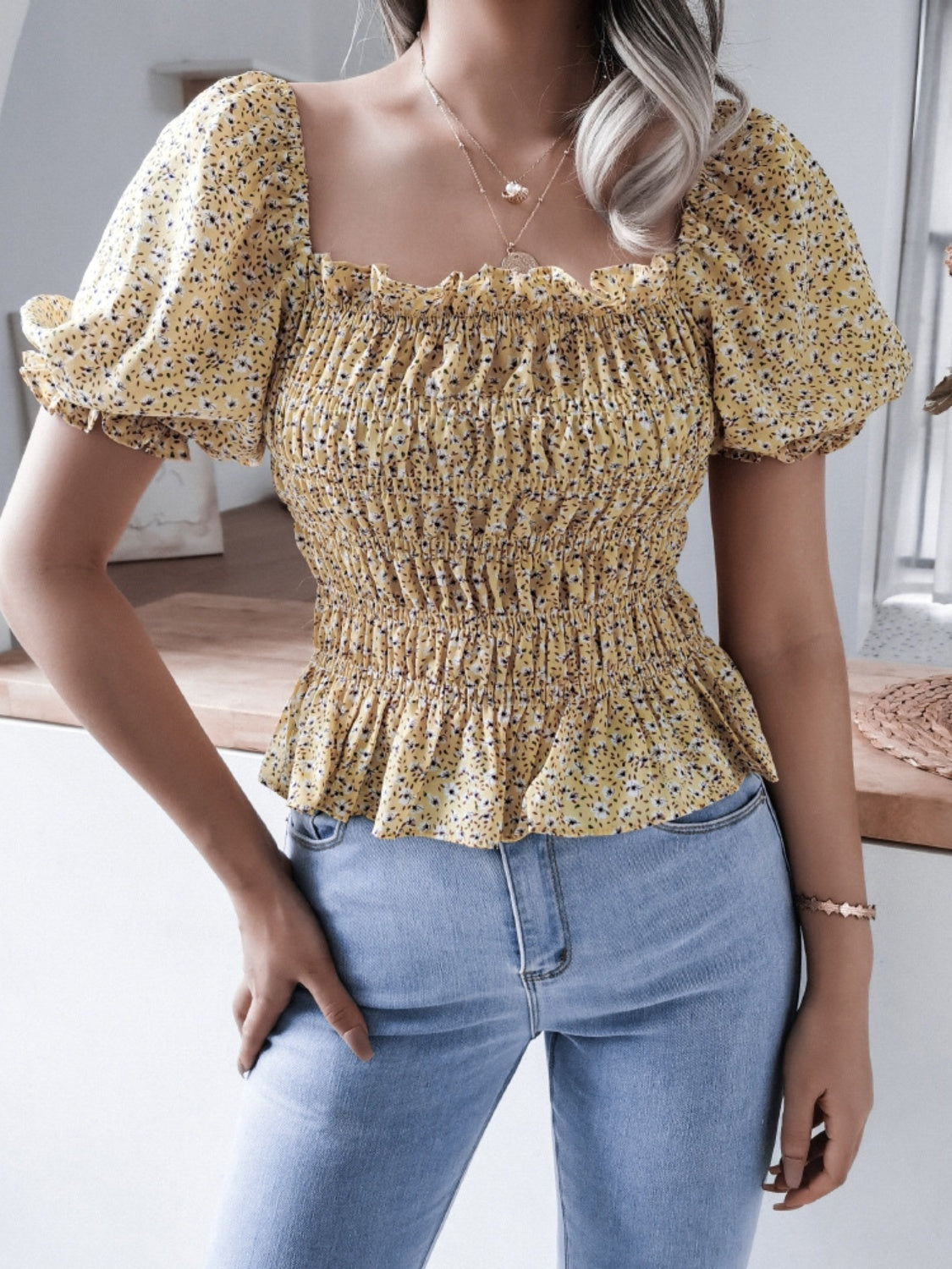 Frill smocked square neck short sleeve blouse.