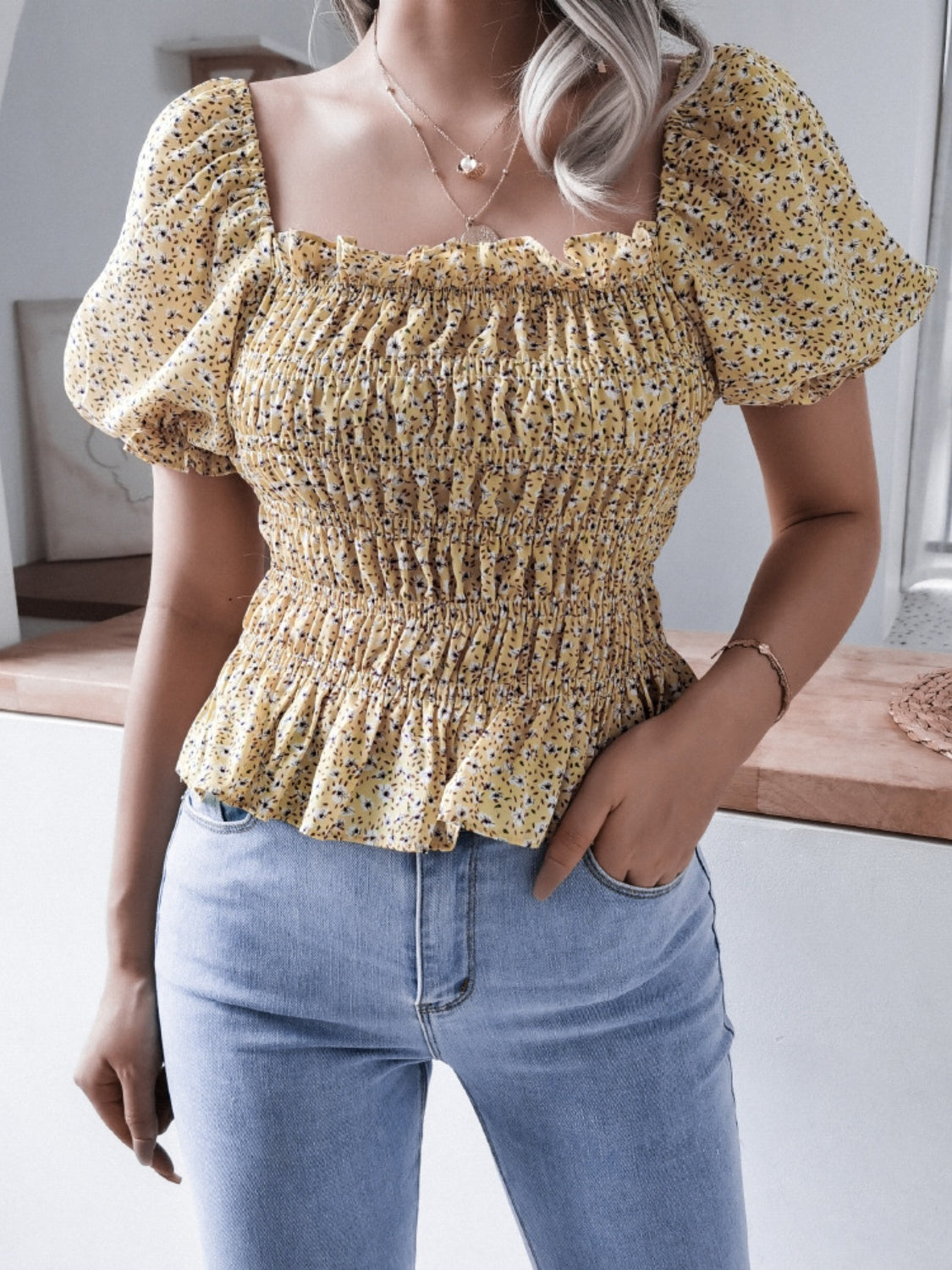 Frill smocked square neck short sleeve blouse.