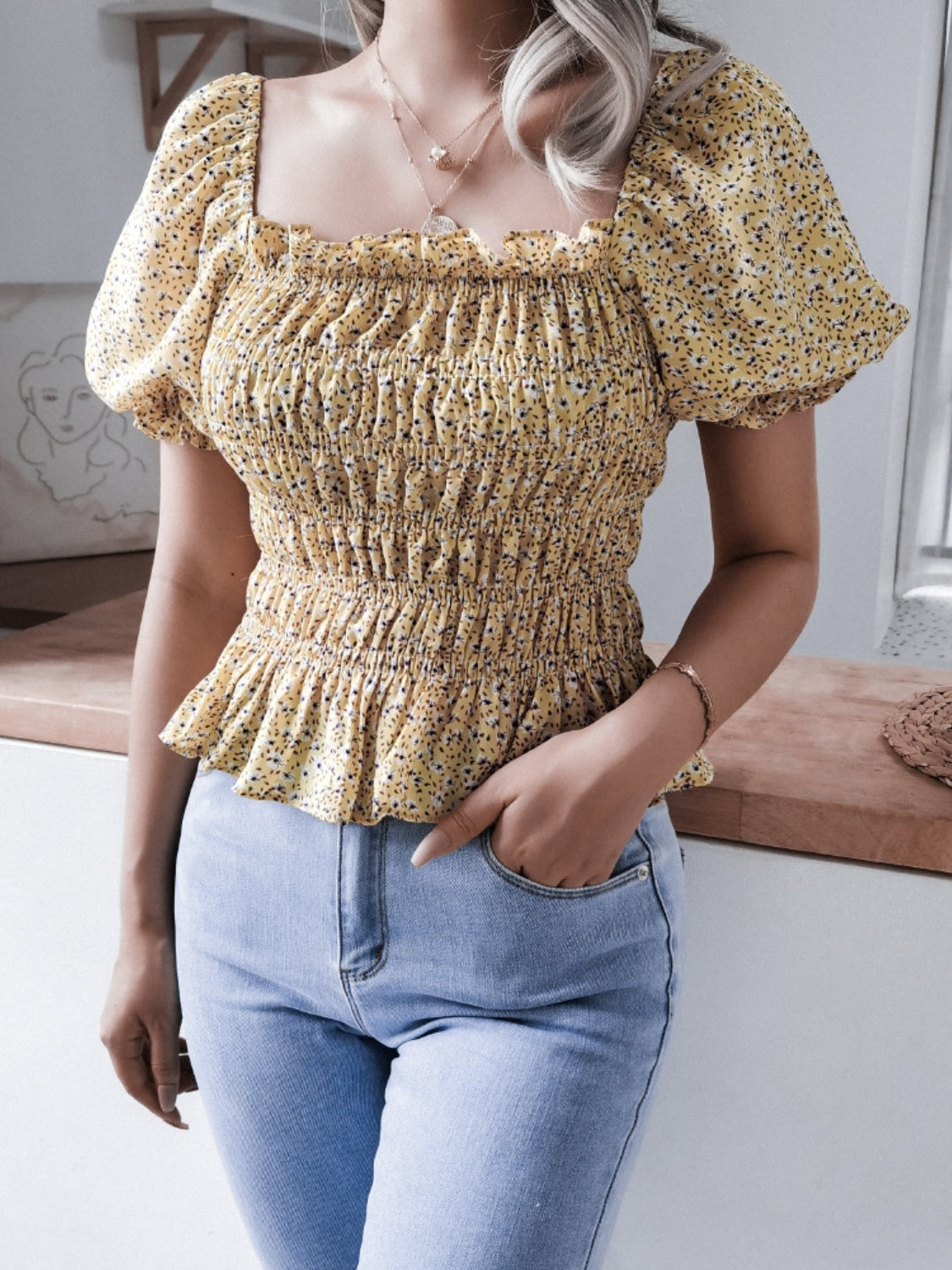 Frill smocked square neck short sleeve blouse.
