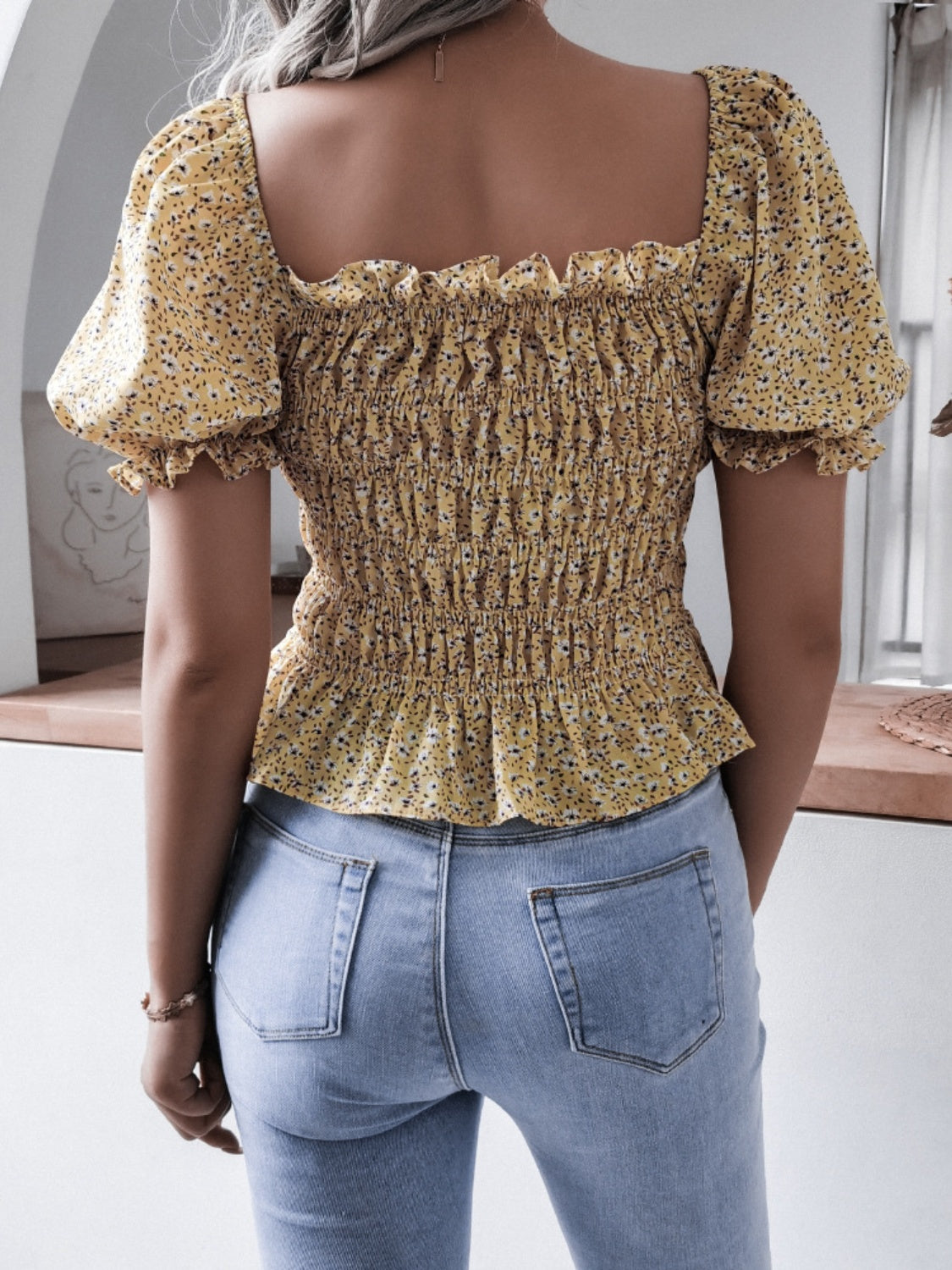 Frill smocked square neck short sleeve blouse.
