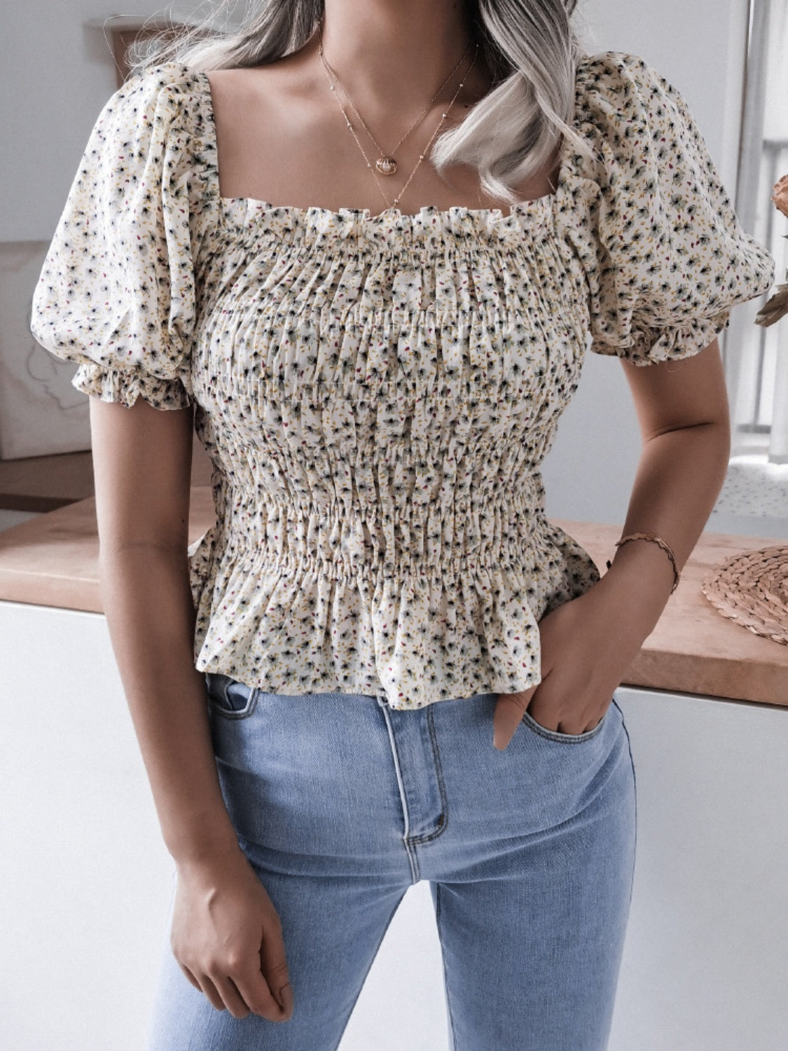 Frill smocked square neck short sleeve blouse.