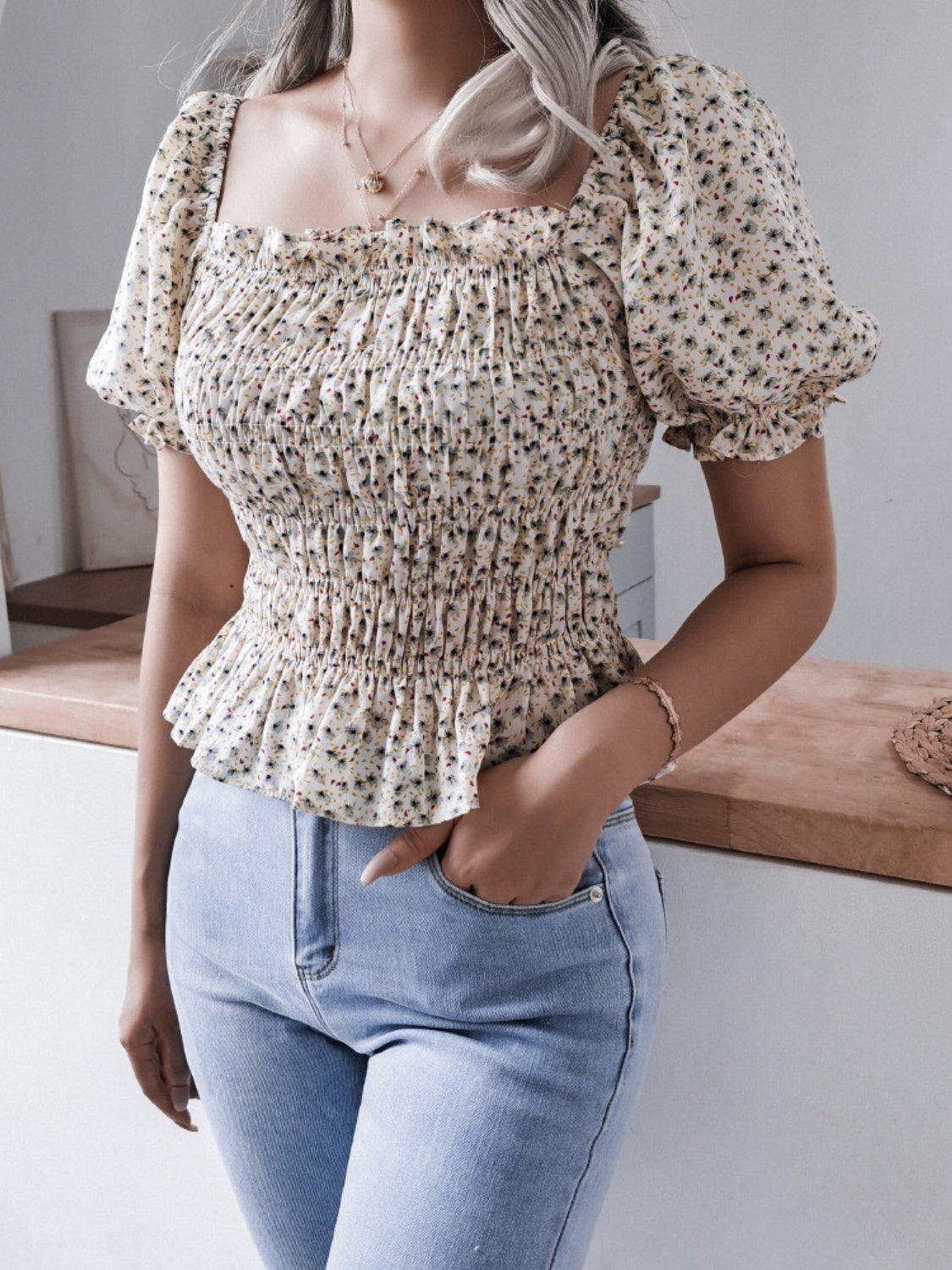 Frill smocked square neck short sleeve blouse.