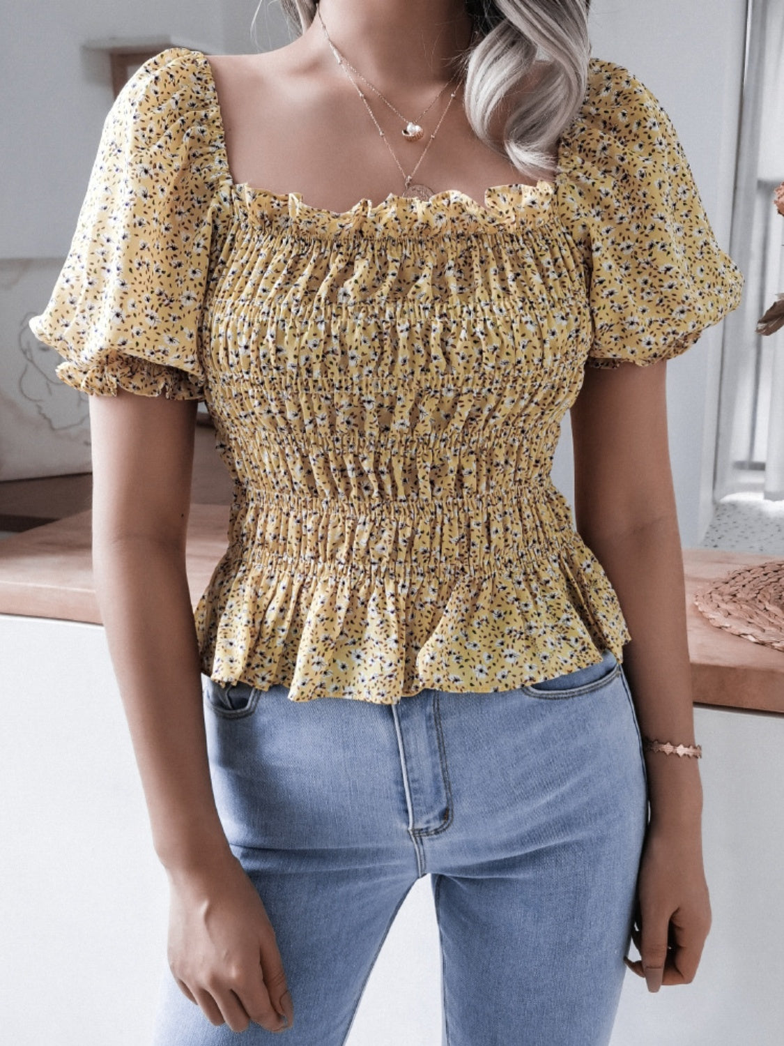 Frill smocked square neck short sleeve blouse.