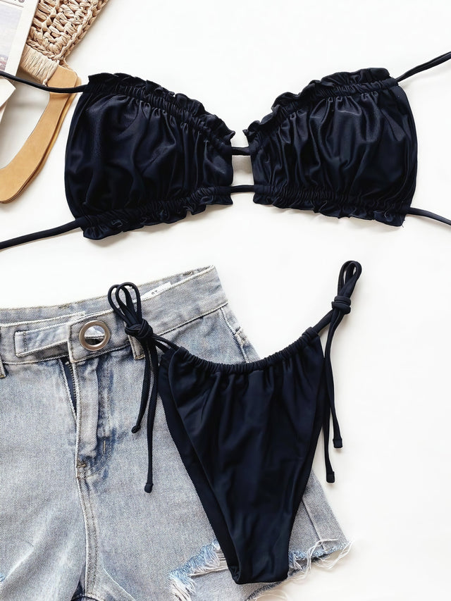 Leopard print halter neck bikini set with frill trim and tie sides.