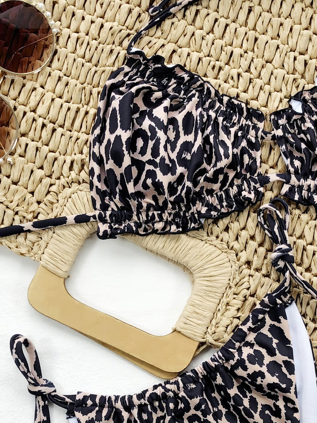 Leopard print halter neck bikini set with frill trim and tie sides.