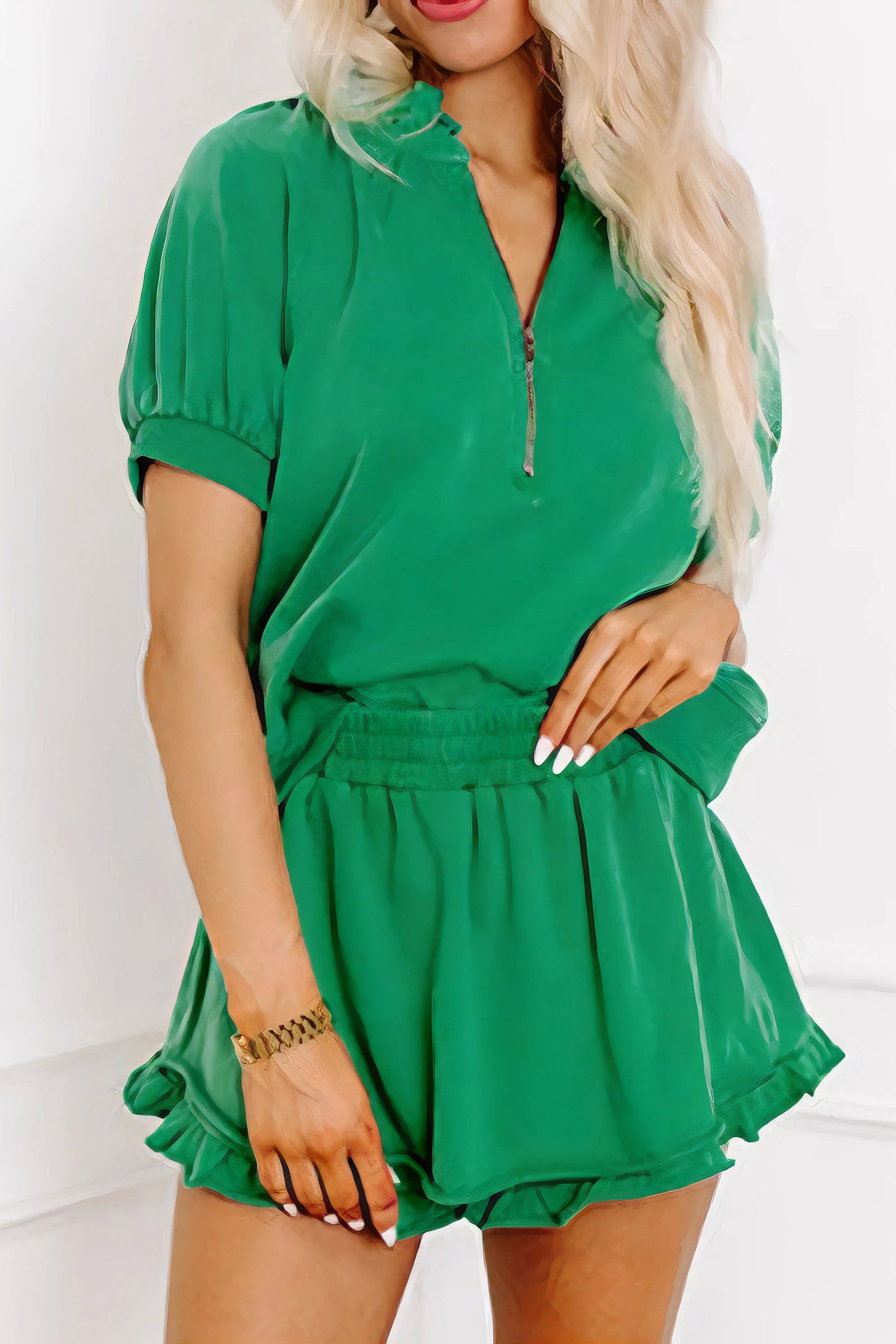 Frill zip front puff sleeve top and skort set, women's stylish two-piece outfit, feminine frill details, puff sleeves, comfortable skort, slightly stretchy fabric, polyester cotton elastane blend, perfect for a chic and playful look