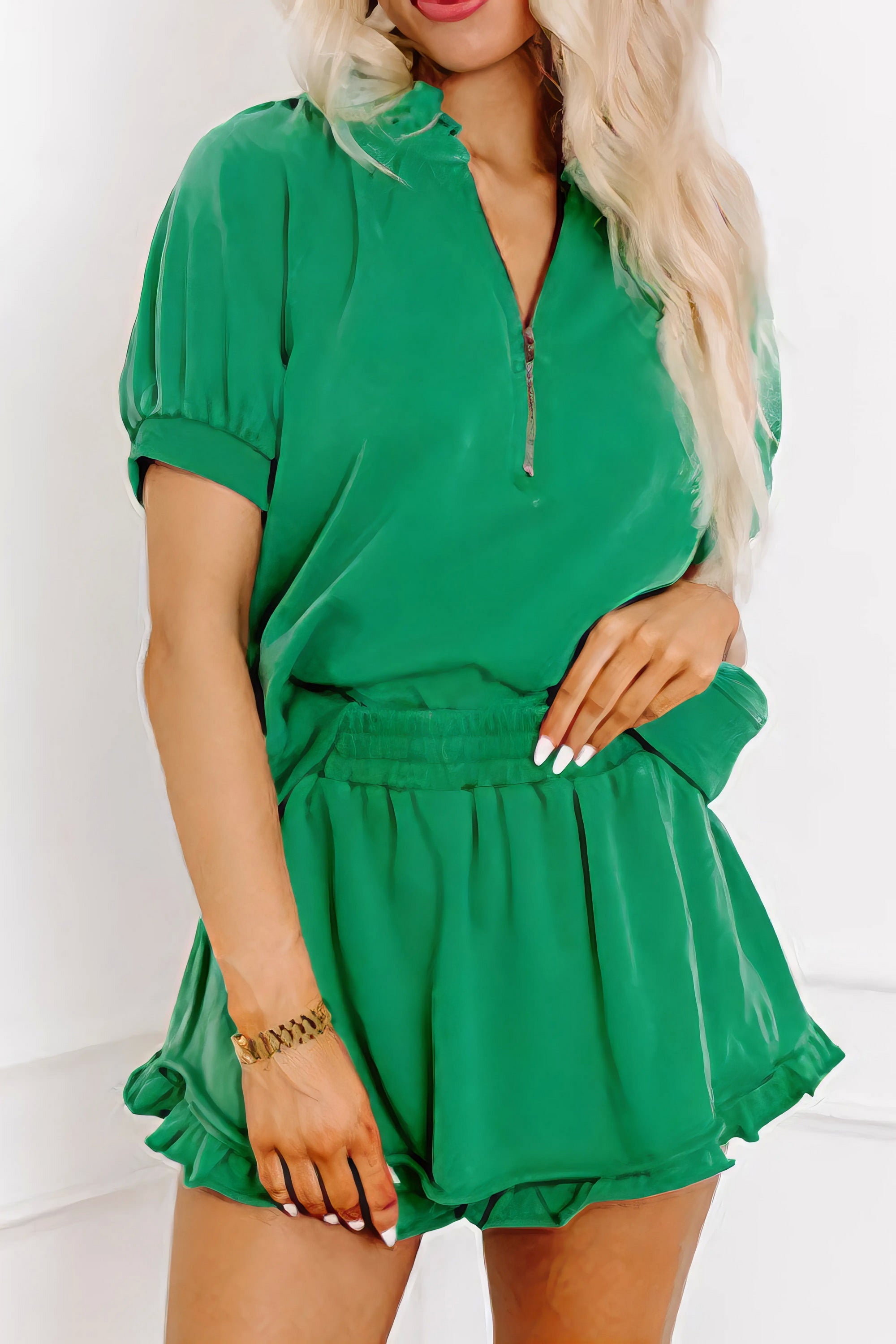 Frill zip front puff sleeve top and skort set, women's stylish two-piece outfit, feminine frill details, puff sleeves, comfortable skort, slightly stretchy fabric, polyester cotton elastane blend, perfect for a chic and playful look