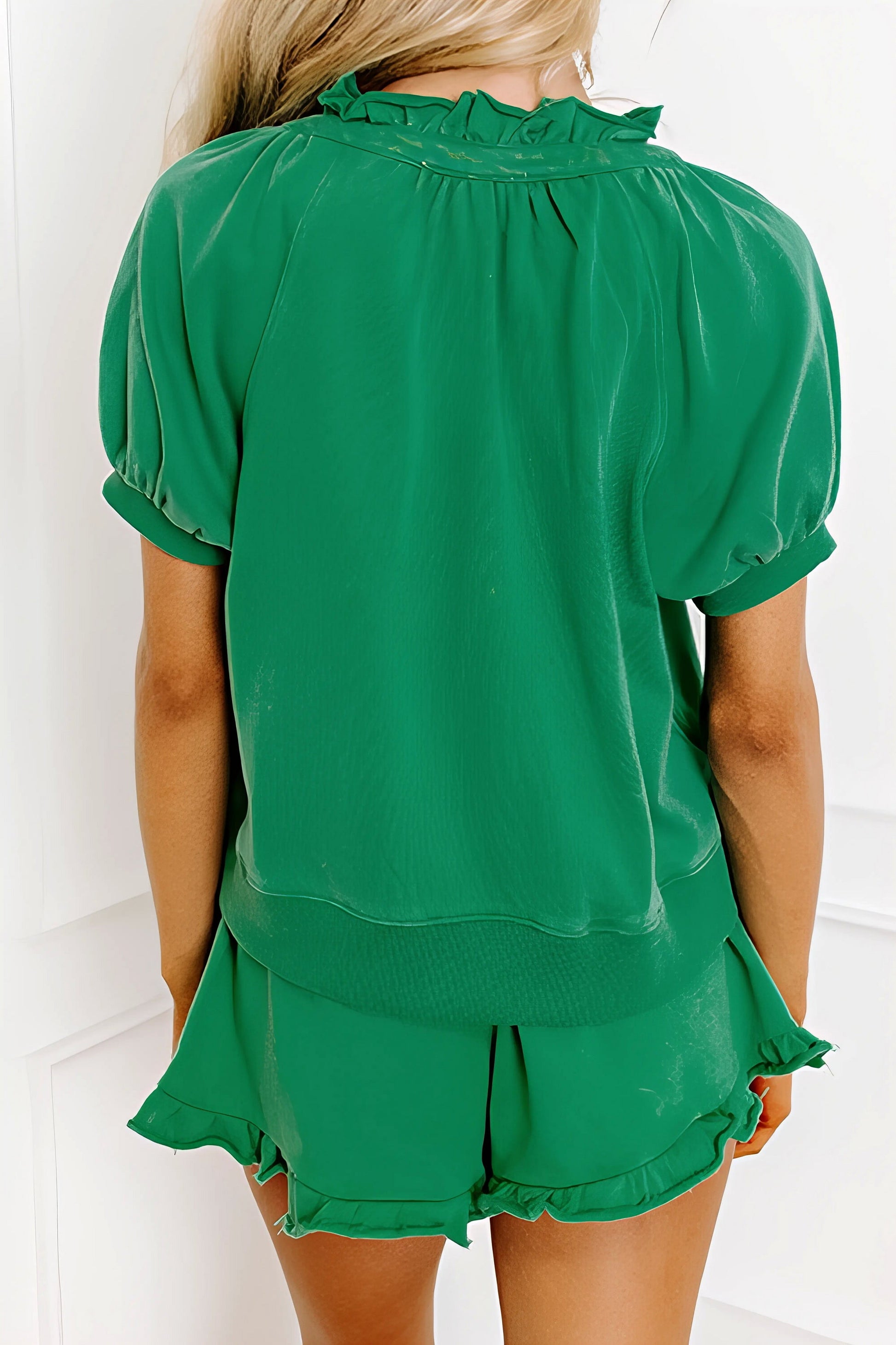 Frill zip front puff sleeve top and skort set, women's stylish two-piece outfit, feminine frill details, puff sleeves, comfortable skort, slightly stretchy fabric, polyester cotton elastane blend, perfect for a chic and playful look