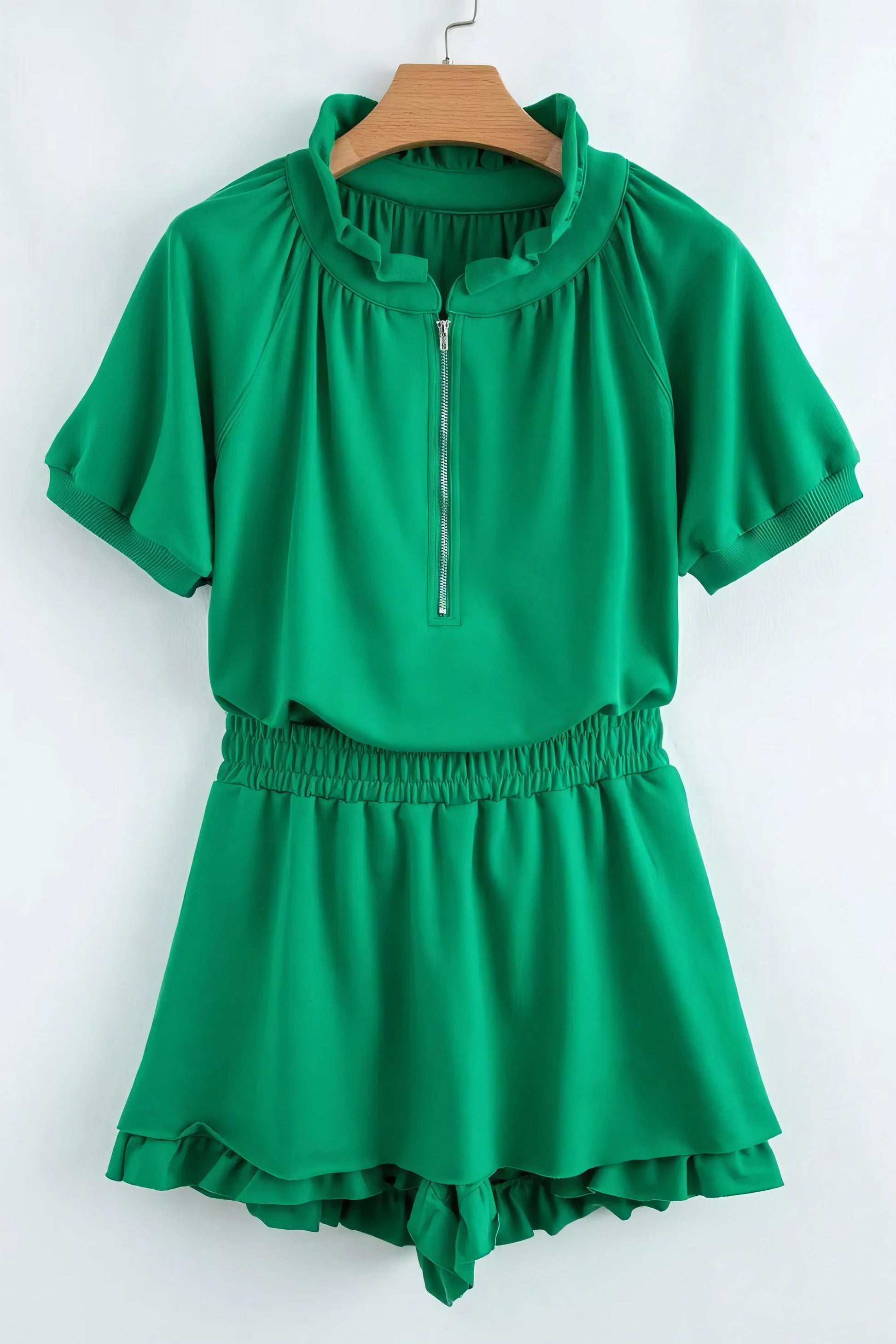 Frill zip front puff sleeve top and skort set, women's stylish two-piece outfit, feminine frill details, puff sleeves, comfortable skort, slightly stretchy fabric, polyester cotton elastane blend, perfect for a chic and playful look