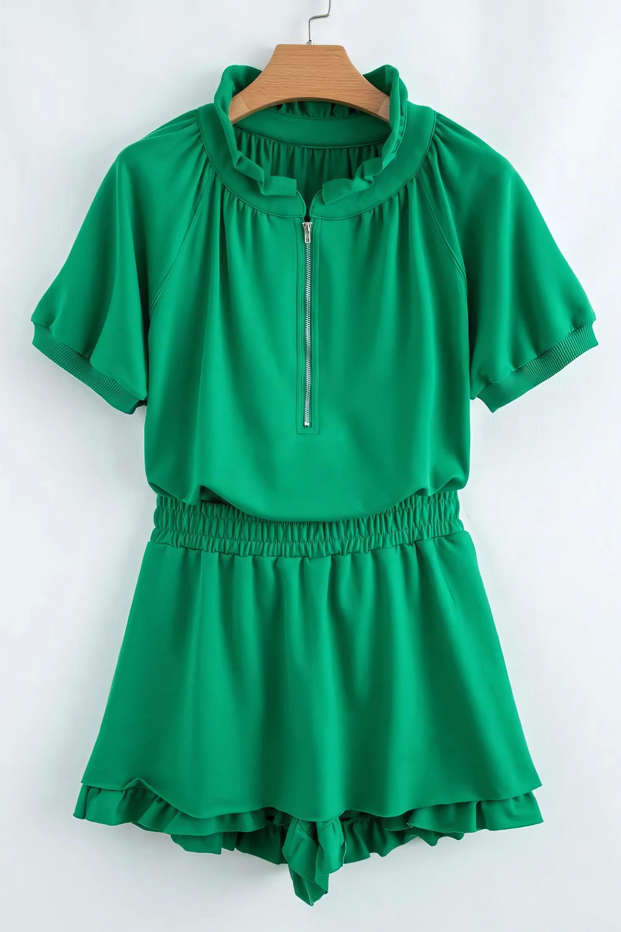 Frill zip front puff sleeve top and skort set, women's stylish two-piece outfit, feminine frill details, puff sleeves, comfortable skort, slightly stretchy fabric, polyester cotton elastane blend, perfect for a chic and playful look