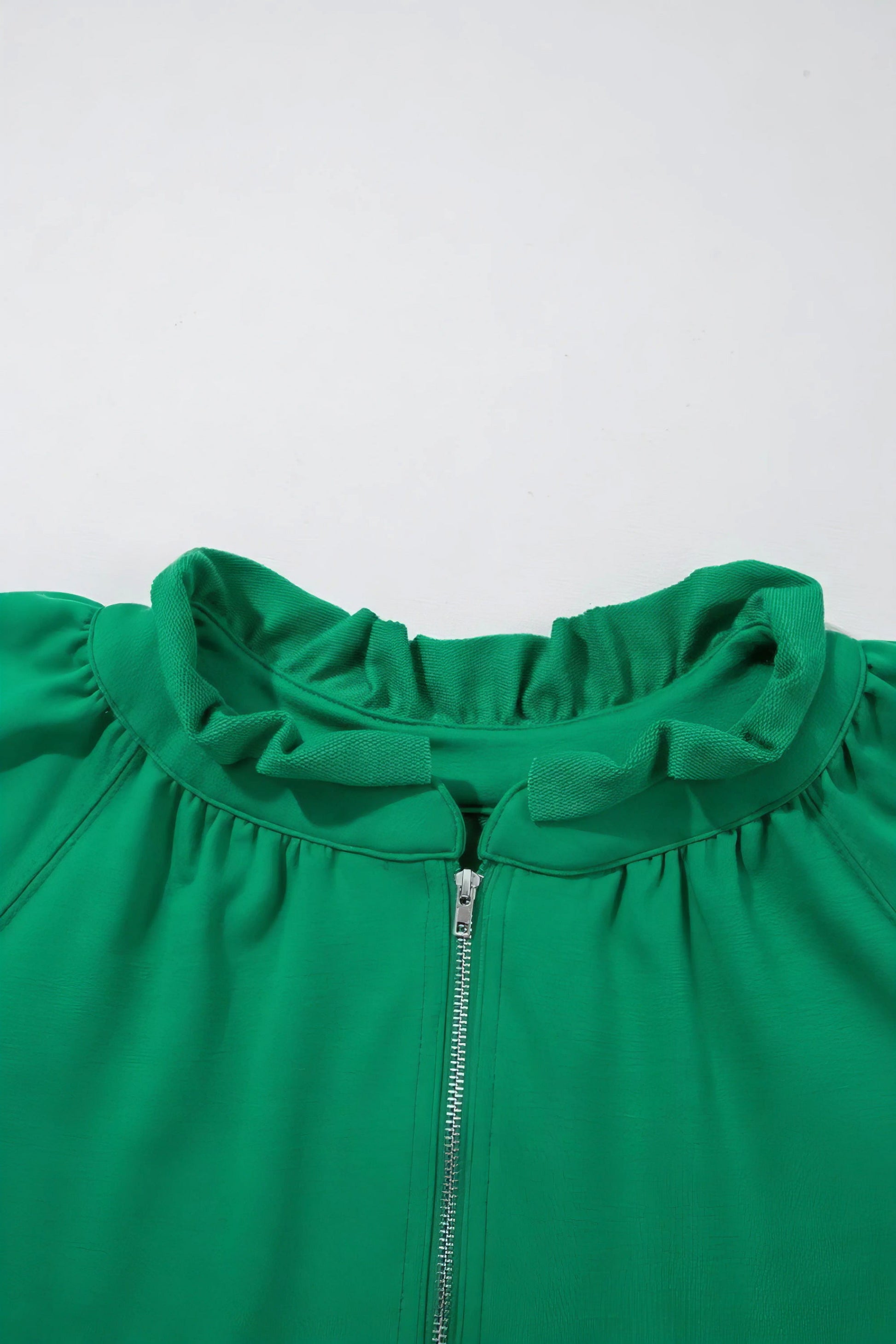 Frill zip front puff sleeve top and skort set, women's stylish two-piece outfit, feminine frill details, puff sleeves, comfortable skort, slightly stretchy fabric, polyester cotton elastane blend, perfect for a chic and playful look