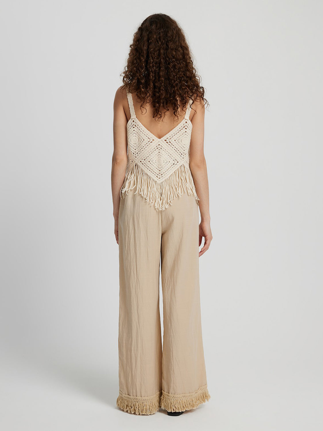 Fringe hem wide leg long pants, opaque.