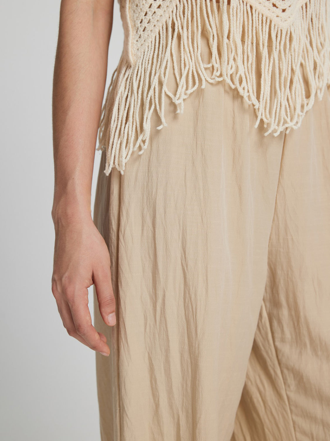 Fringe hem wide leg long pants, opaque.