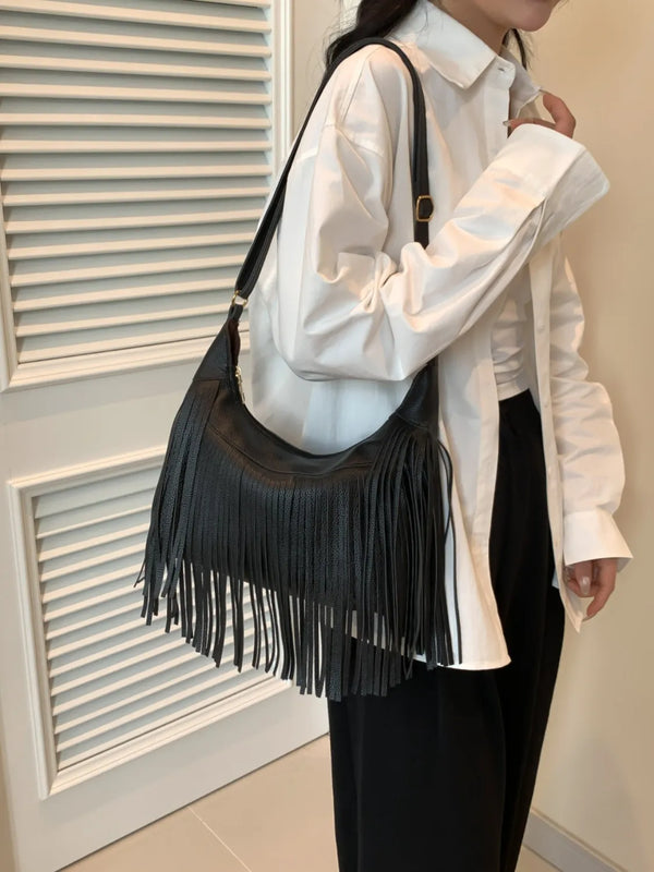 Medium PU leather fringe shoulder bag.