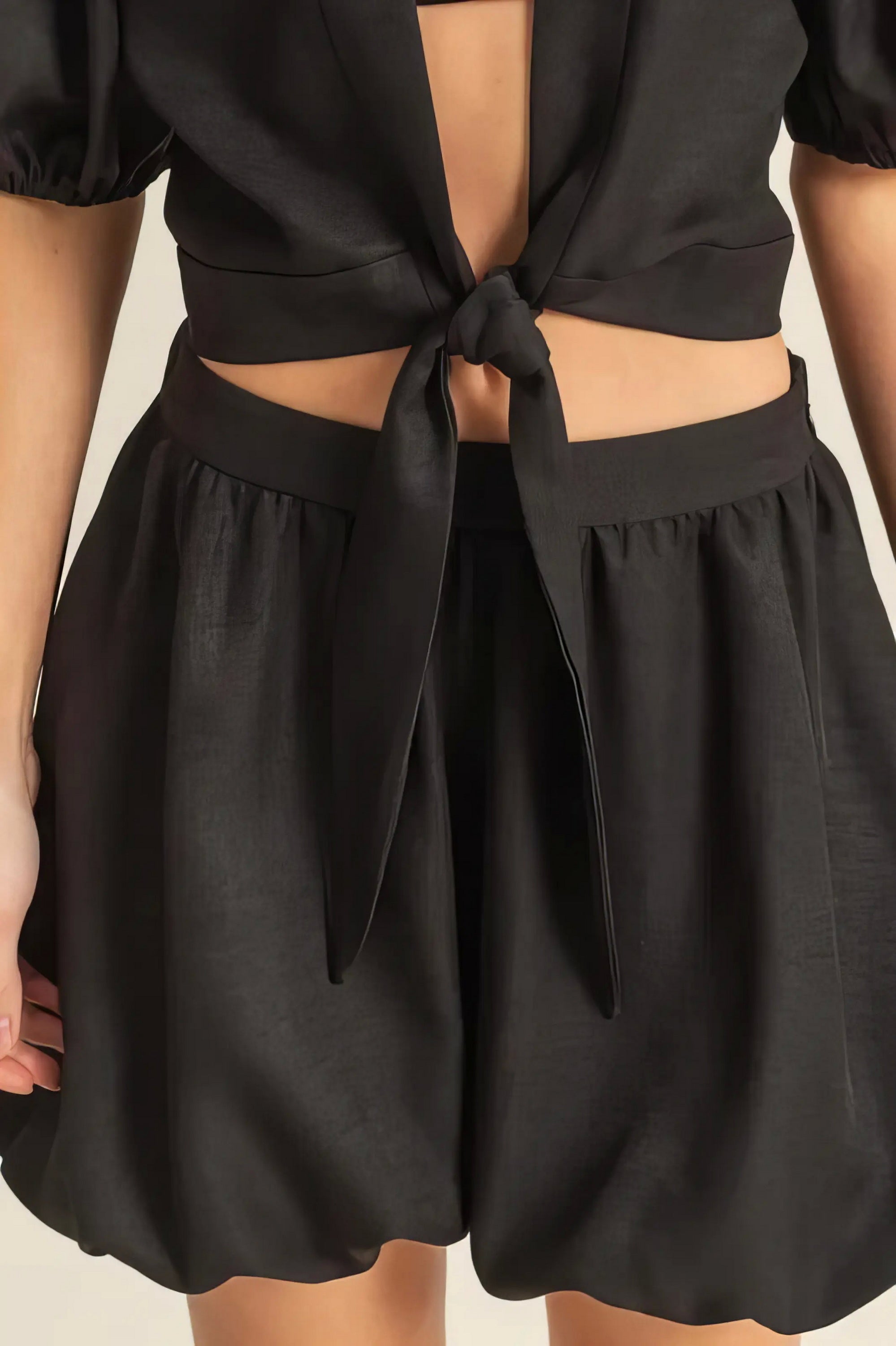 front tie top and bubble hem shorts set, playful women's summer outfit, cute two-piece set, trendy front tie detail, stylish bubble hem shorts, flirty summer fashion, ideal for warm weather fun