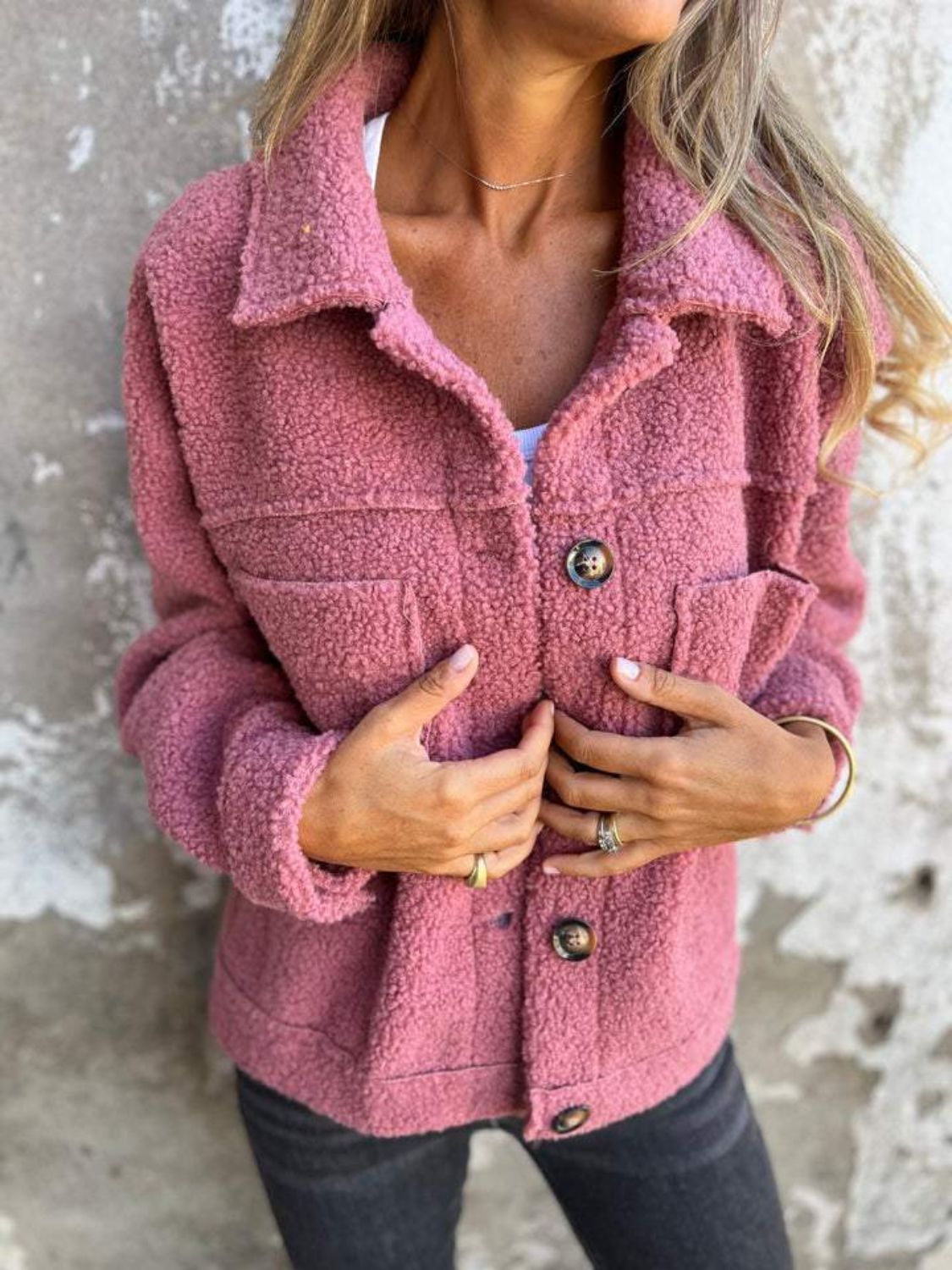 Full size fuzzy button up drop shoulder jacket with pockets.