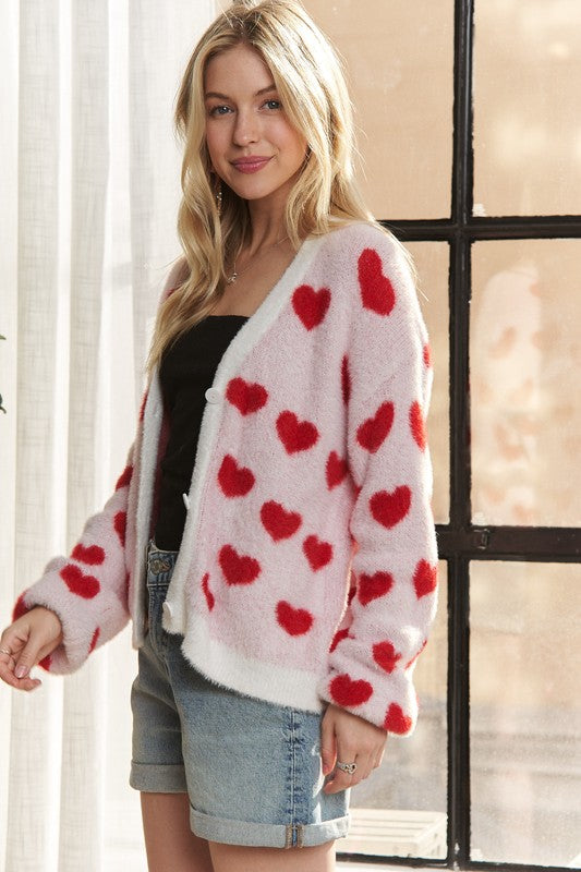 Fuzzy heart button down cardigan with ribbed details.