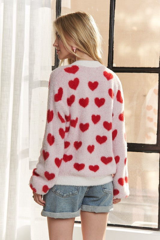 Fuzzy heart button down cardigan with ribbed details.