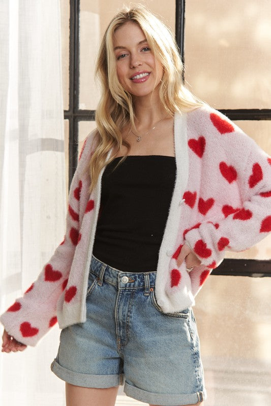 Fuzzy heart button down cardigan with ribbed details.