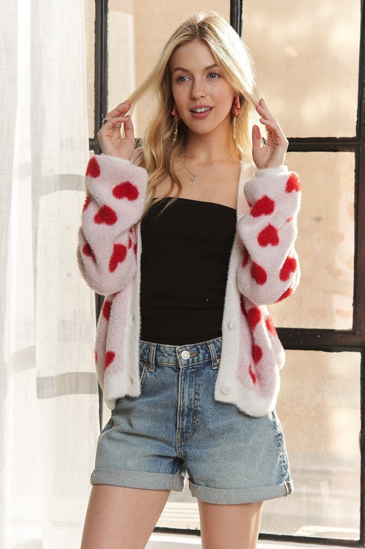 Fuzzy heart button down cardigan with ribbed details.