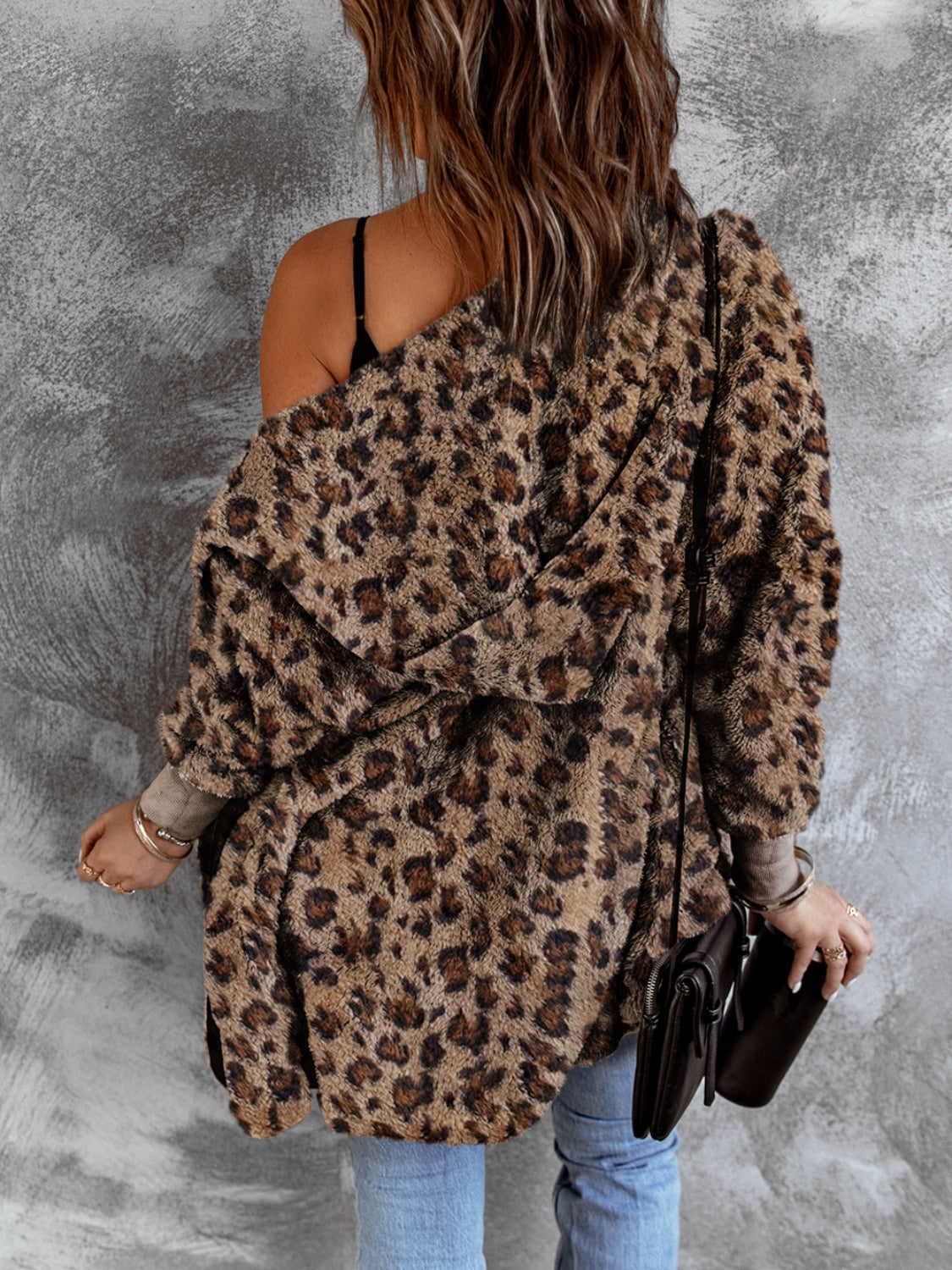 Fuzzy leopard long sleeve hooded jacket.